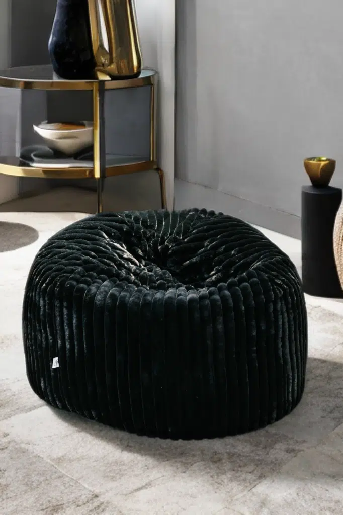 POUF TOUAREG FOURRURE COTELÉE 100*70 – NOIR
